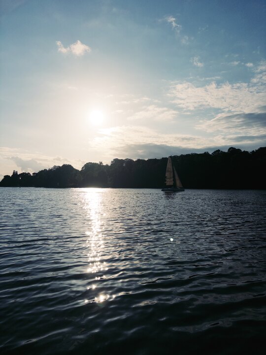 View from the Badestelle bathing spot across the water towards Pfaueninsel (Peacock Island) in Berlin.